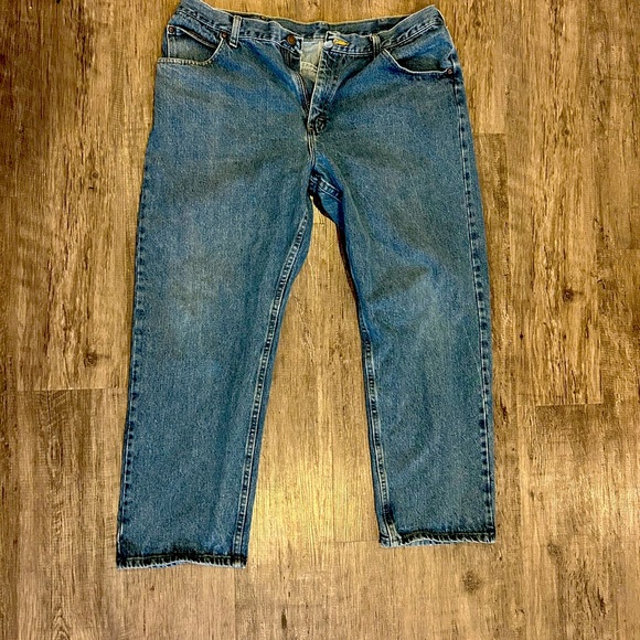 Wrangler blue jeans with a 30” inseam and 38” waist jeans. Like new condition. - Picture 1 of 3